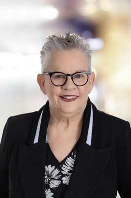 Portrait of Annie Fulks, REALTOR® | ABR® | CFSP | MRP | AHWD | e‑PRO® | NRLUX